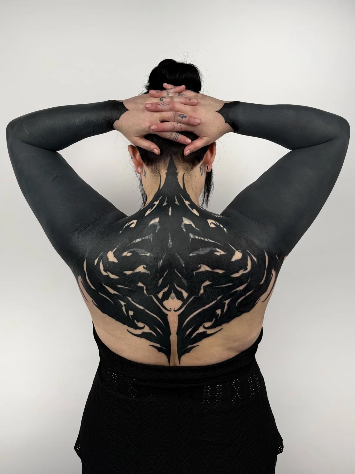 Dark ornamental back piece